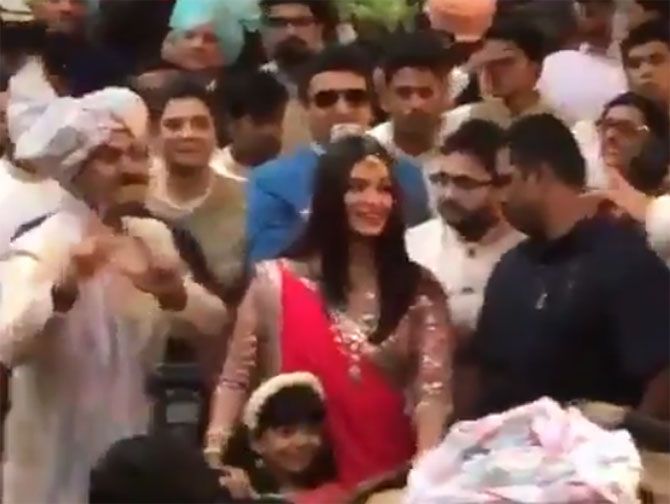 Aishwarya Rai Bachchan and daughter Aaradhya do 'bhangra' at family friend's wedding in Mumbai